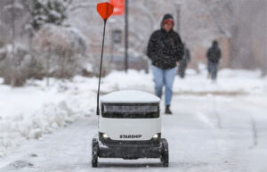 Starship says its delivery robots are capable of handling diverse conditions such as snow, shown here.